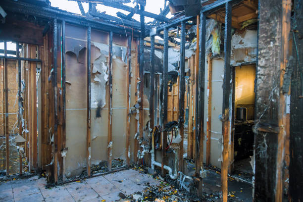 Professional Fire Damage Restoration technician working in Great Bend, NY